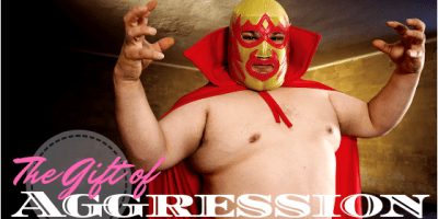 Shirtless wrestler stretching his "muscles".